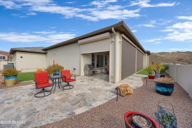 view of patio with a mountain view