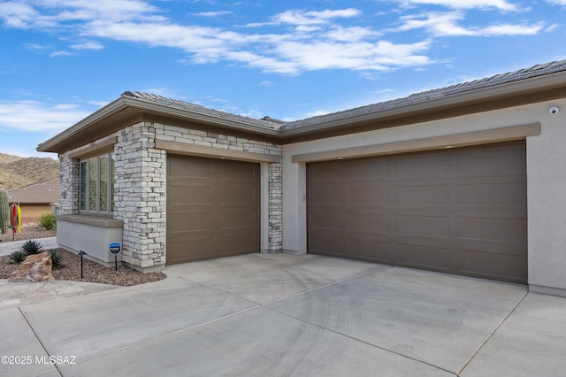 view of property exterior with a garage