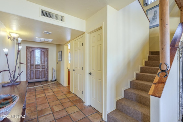 view of tiled foyer entrance