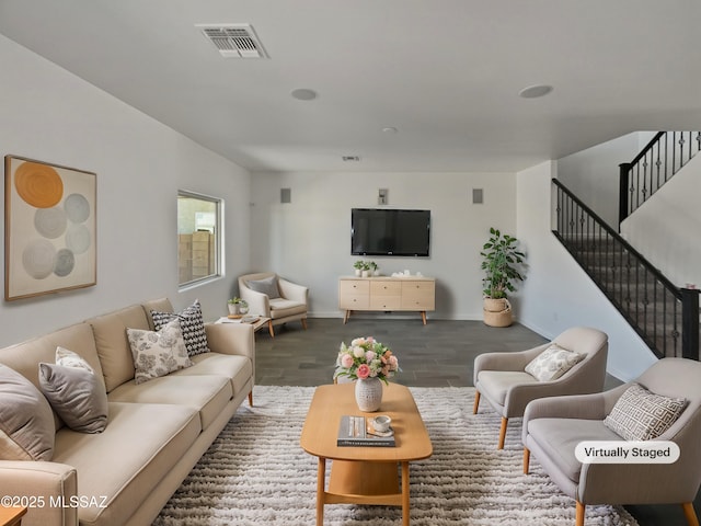 living room with dark hardwood / wood-style floors