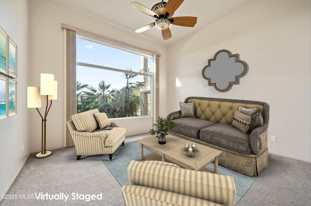 carpeted living room featuring ceiling fan