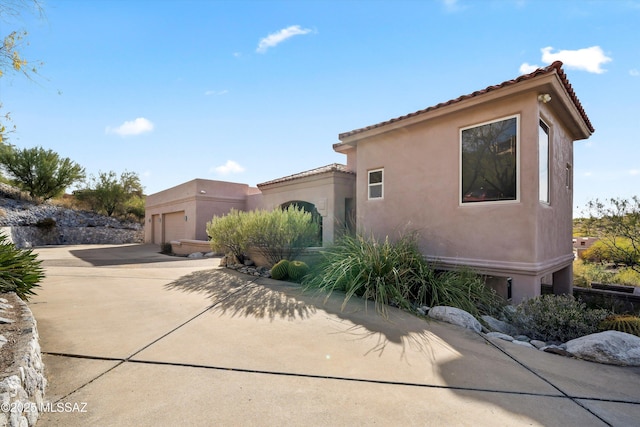 view of front of property with a garage