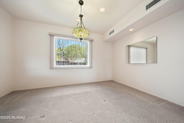 empty room with carpet flooring