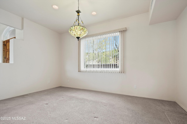 view of carpeted spare room