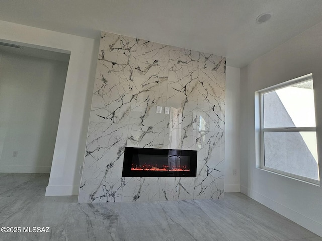 room details featuring a high end fireplace
