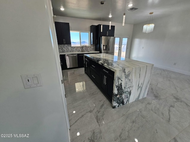 kitchen with dark cabinets, french doors, visible vents, stainless steel appliances, and marble finish floor