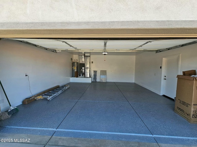 garage featuring water heater