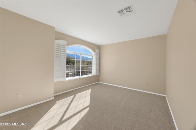 view of carpeted spare room