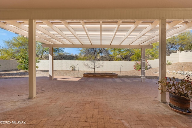 view of patio featuring a pergola