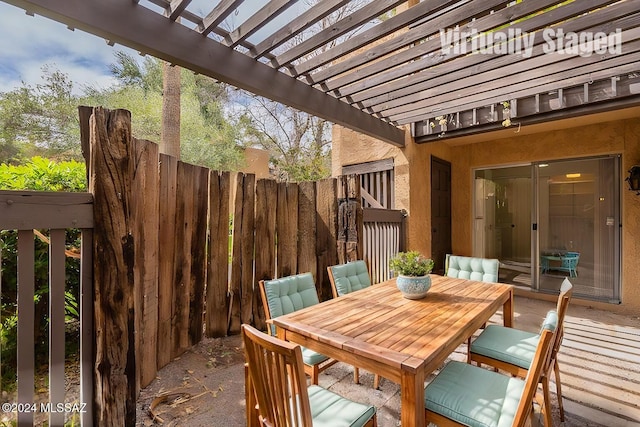 view of patio / terrace featuring a pergola