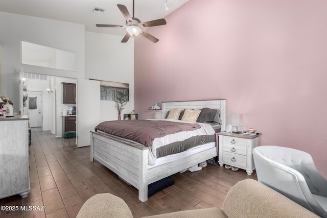 bedroom featuring high vaulted ceiling and ceiling fan