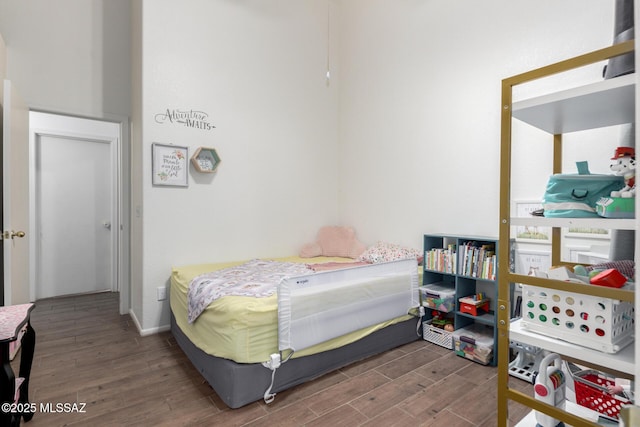 bedroom featuring dark hardwood / wood-style floors