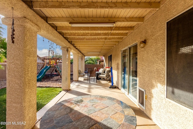 view of patio / terrace featuring a playground