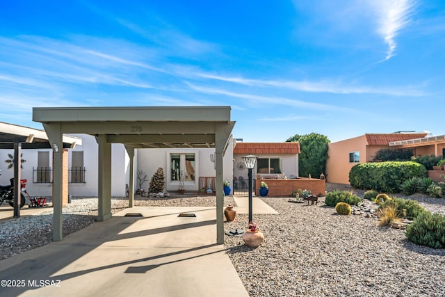 view of patio / terrace featuring fence