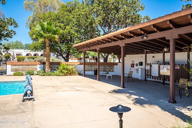 view of swimming pool featuring a mail area