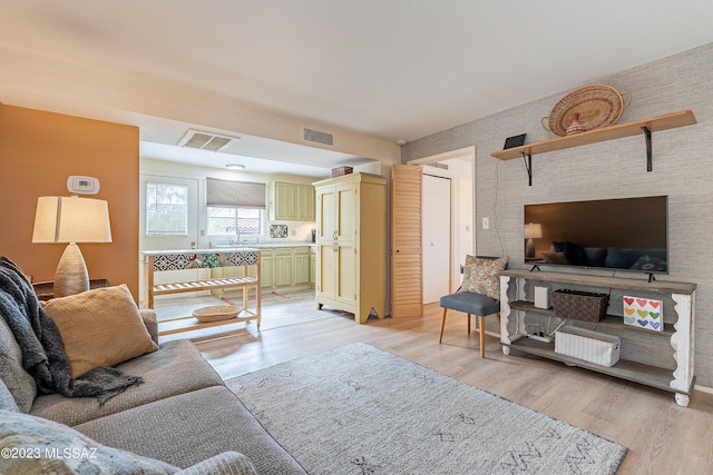 living room featuring light hardwood / wood-style floors