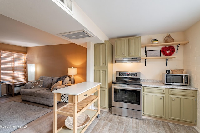 kitchen featuring green cabinets, light hardwood / wood-style flooring, and stainless steel appliances