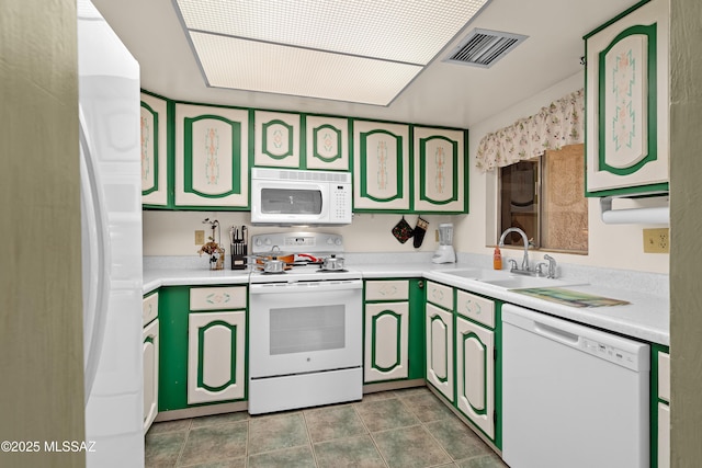 kitchen with sink and white appliances