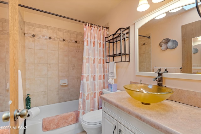 full bathroom with vanity, toilet, and shower / bath combo with shower curtain