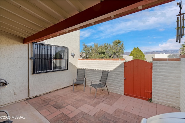 view of patio featuring a mountain view