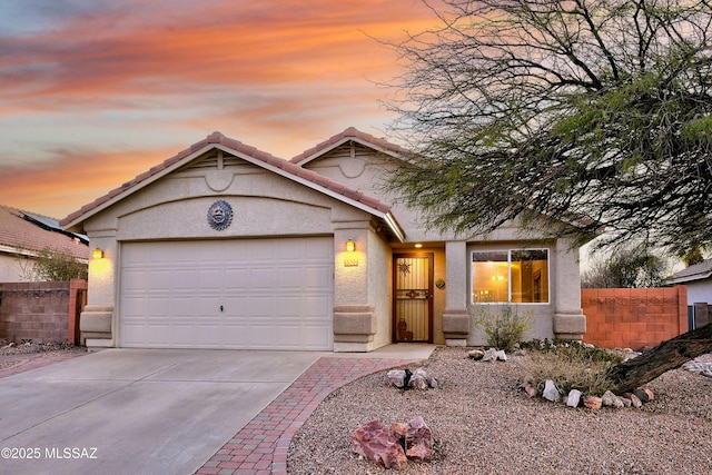 view of front of home featuring a garage