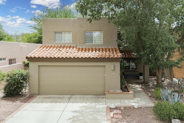 view of front of property with a garage