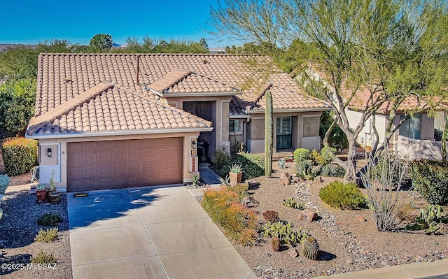 view of front of property with a garage