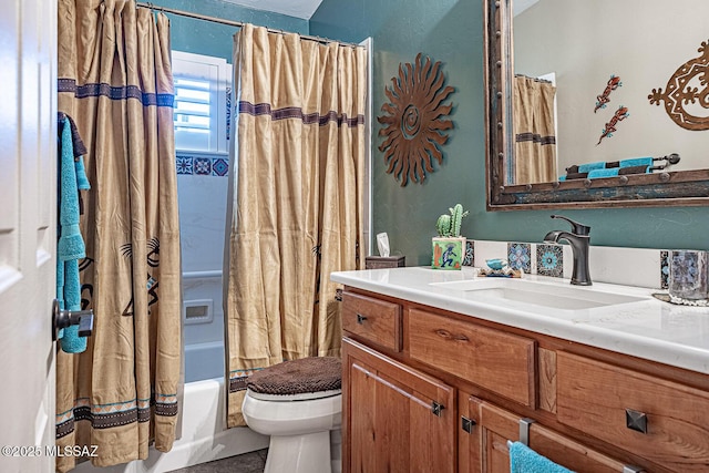 full bathroom with toilet, vanity, and shower / bath combo with shower curtain