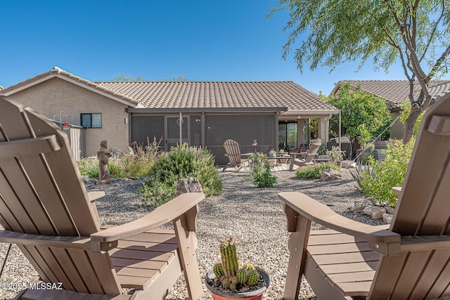 back of house with a patio