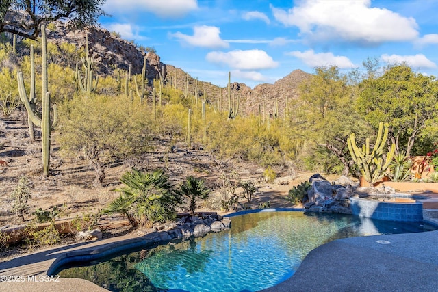 view of pool featuring a mountain view