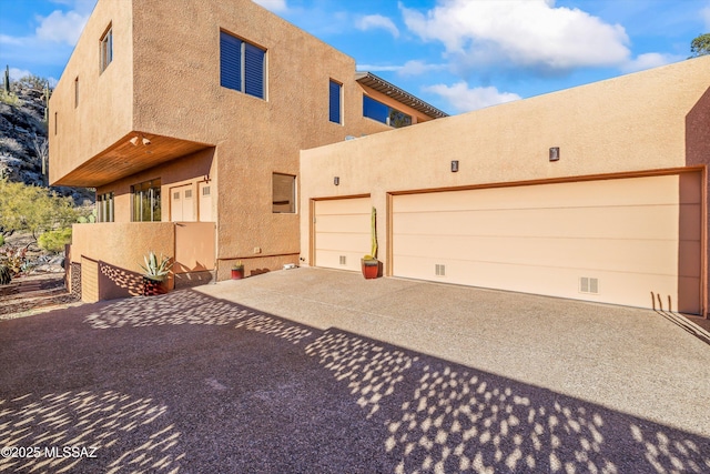 exterior space featuring a garage