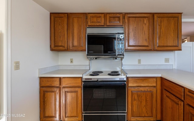 kitchen featuring range with electric cooktop