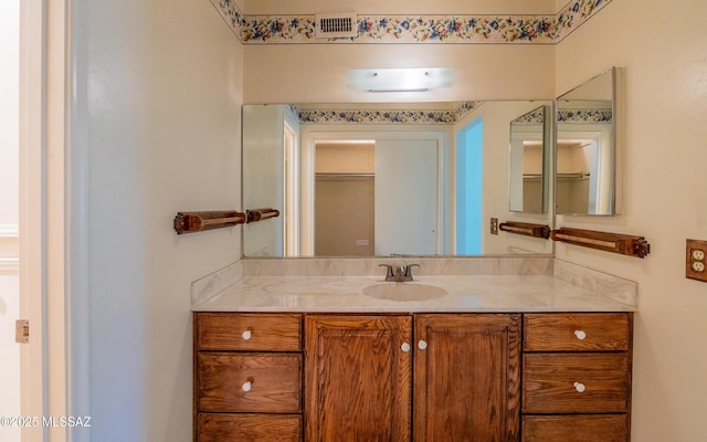 bathroom featuring vanity