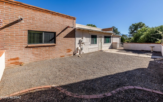 back of house featuring a patio area