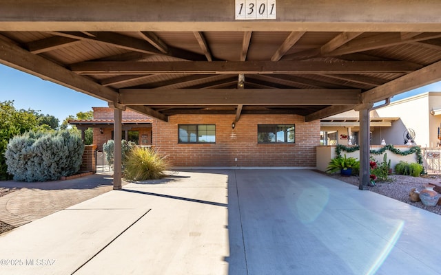 view of patio / terrace with a carport