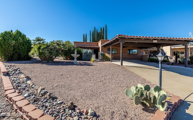 exterior space featuring a carport