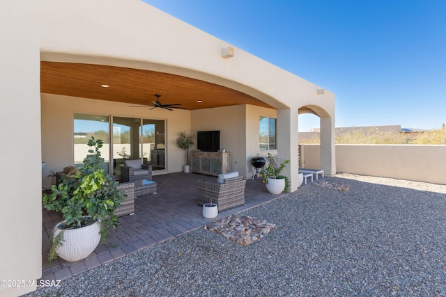 view of patio featuring ceiling fan and an outdoor hangout area