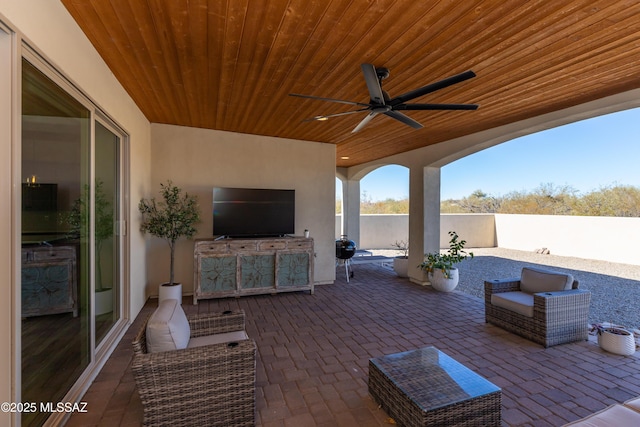 view of patio with ceiling fan