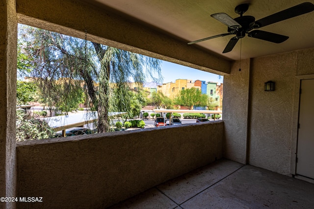 balcony featuring ceiling fan