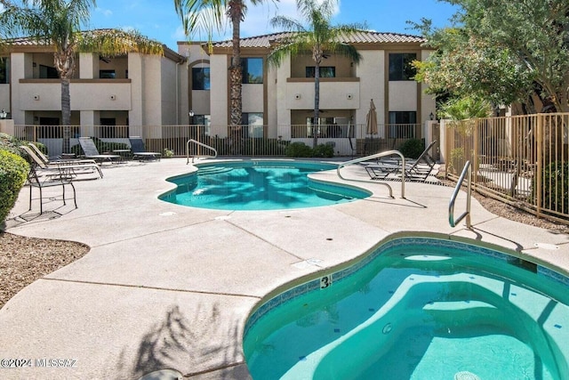 view of pool featuring a patio