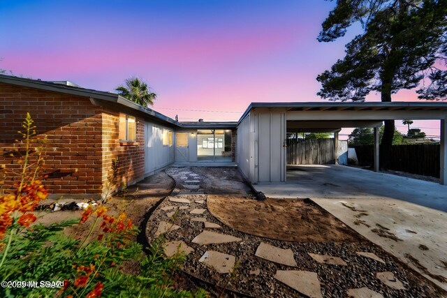 view of front facade featuring a carport