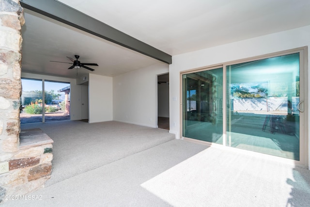 view of patio featuring ceiling fan