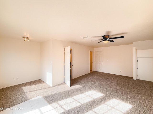 interior space featuring ceiling fan and carpet floors