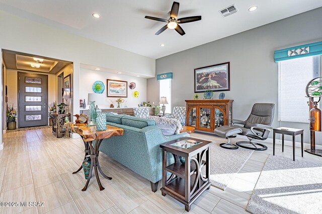 living room with ceiling fan