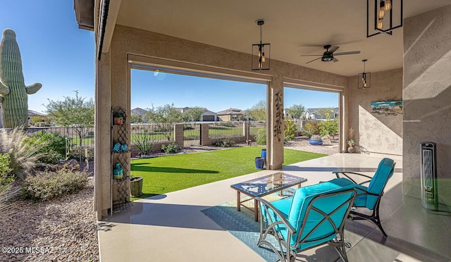 view of patio / terrace with ceiling fan