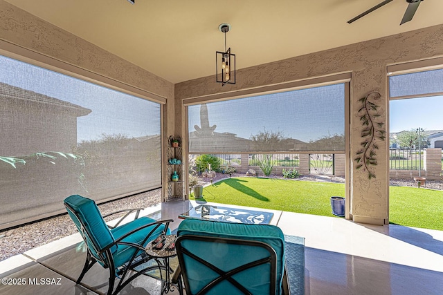 view of patio featuring ceiling fan