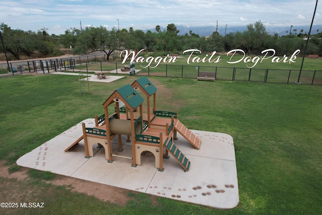 bird's eye view featuring view of golf course and a mountain view