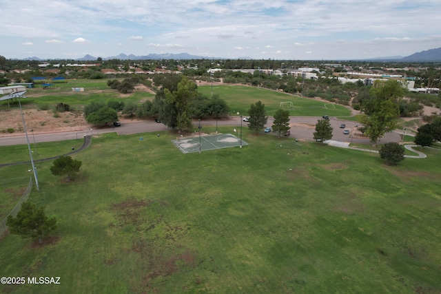 birds eye view of property featuring a mountain view