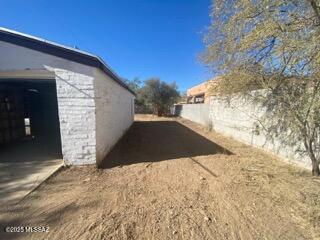 view of side of property with a garage