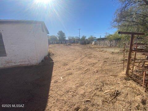 view of yard with a rural view